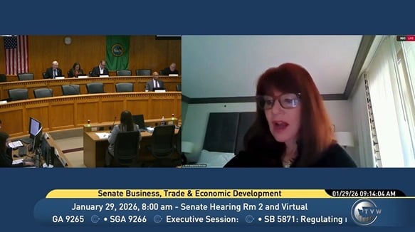 Photo of Stephanie A. Sheridan provides testimony to the Washington State legislature as it considers CEMA reform.