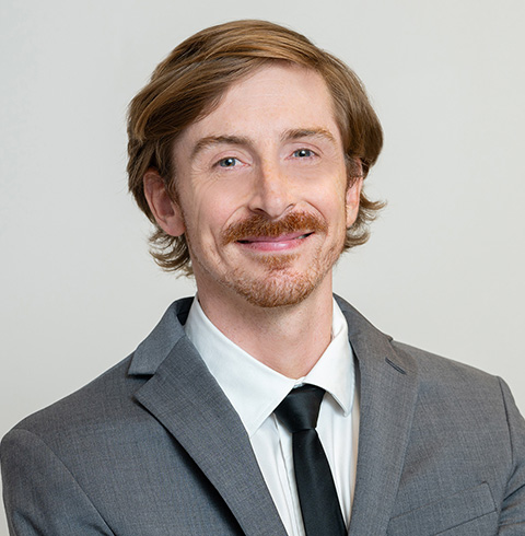 A headshot of Aaron Clemmer.