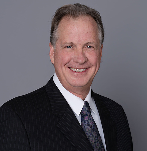 A headshot of Brendan Collins.