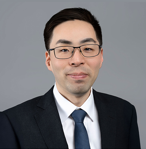 A headshot of Justin Chay.