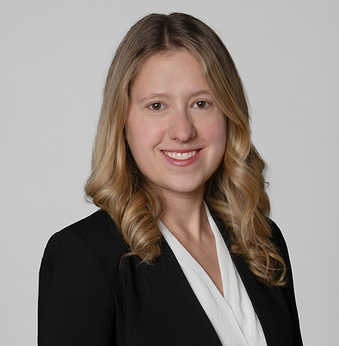 A headshot of Sasha Dudding.