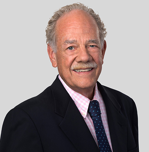 A headshot of Charles Ekberg.