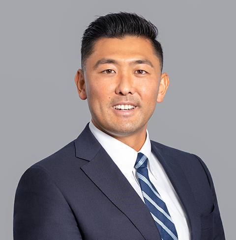 A headshot of Trent Fujii.