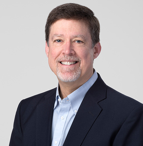 A headshot of Charles Hudson.