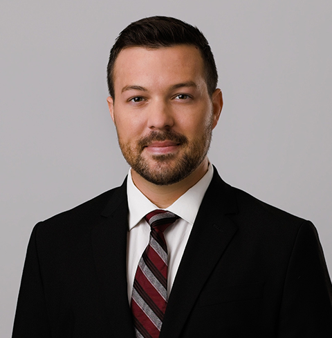 A headshot of Drew Hensley.