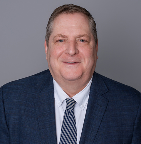 A headshot of Hank Hockeimer.