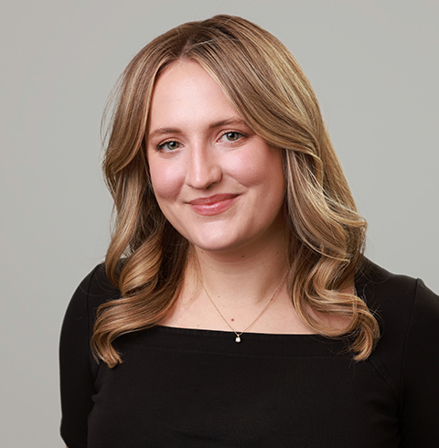 A headshot of Mackenzie Holden.