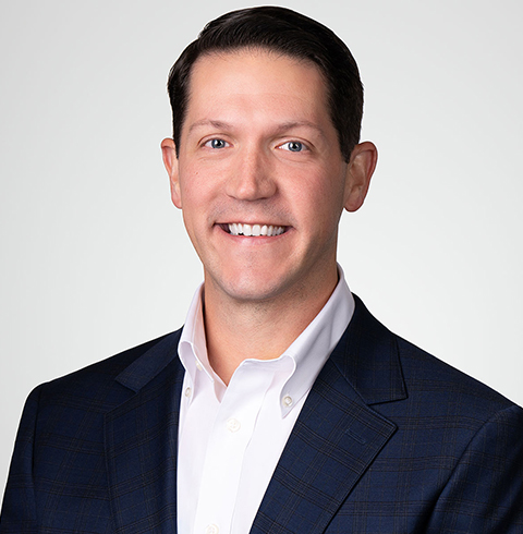 A headshot of Ryan Heck.