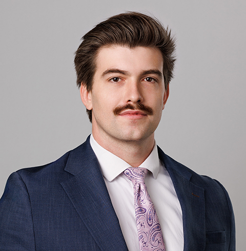 A headshot of Tyler Hodgin.