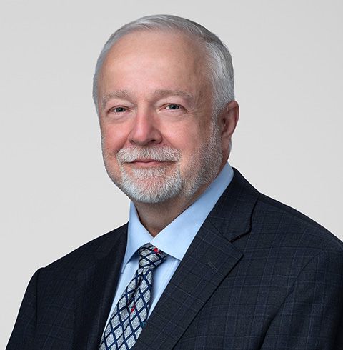 A headshot of Craig Janes.