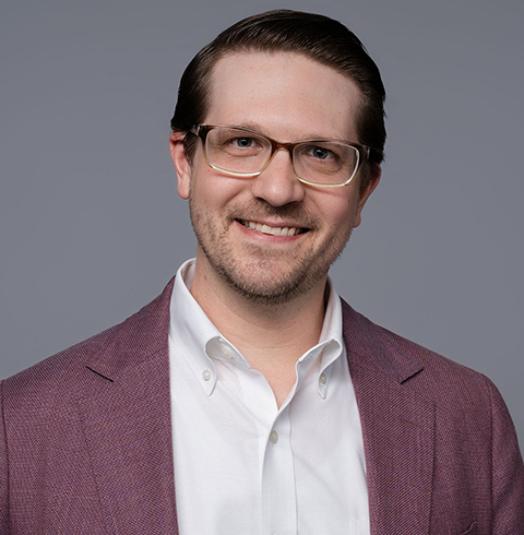 A headshot of Matthew Kussmaul.