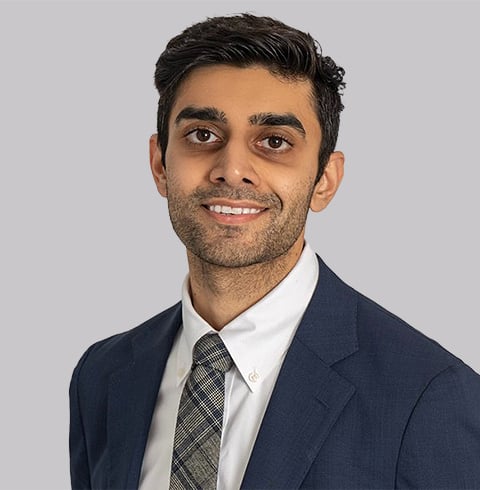 A headshot of Mudasar Pham-Khan.