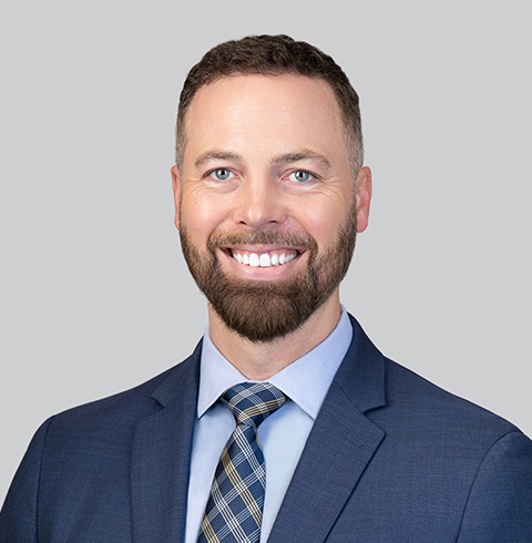 A headshot of Joshua Natzel.