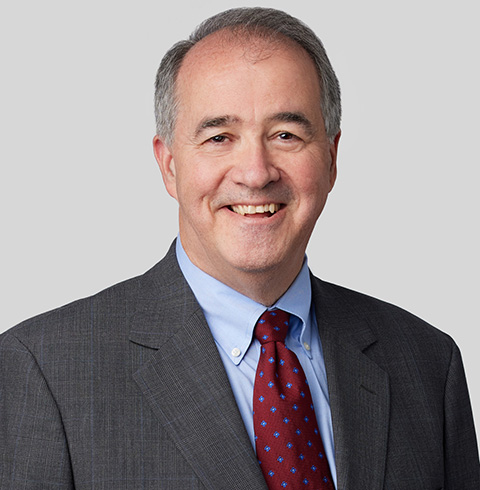 A headshot of Douglas Parker.