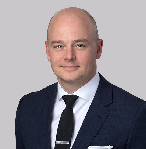 A headshot of Gregory Pyle.