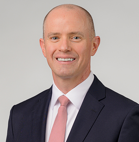 A headshot of Jonathan Rowe.