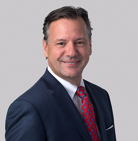 A headshot of Michael Reilly.