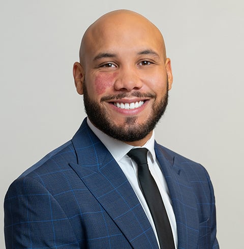 A headshot of Ryan Ricketts.