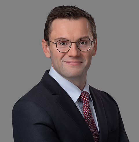 A headshot of Aleksander Schilbach.