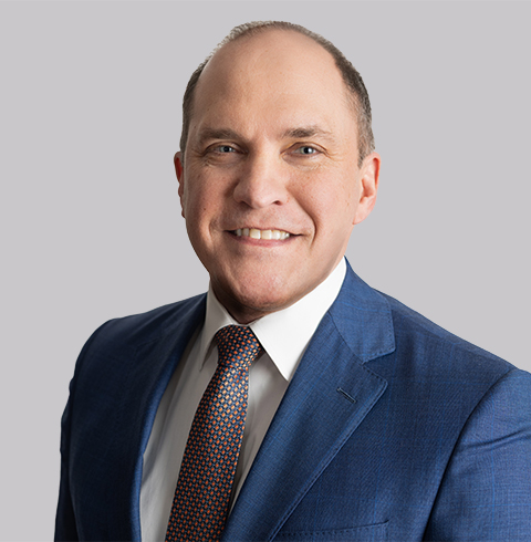 A headshot of Brett Seifarth.