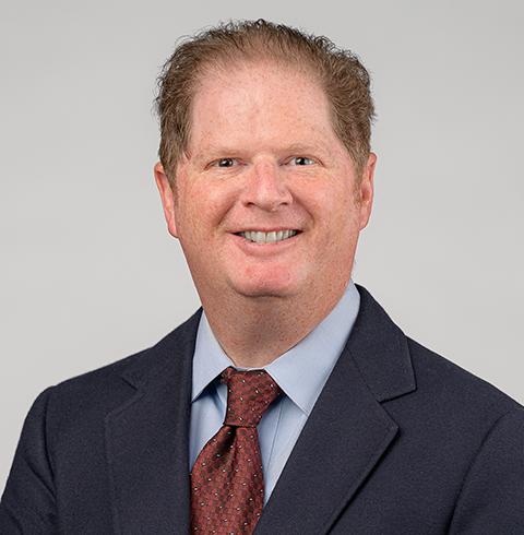 A headshot of Marcus Simon.