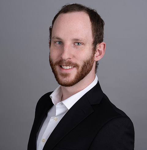 A headshot of Ryan Sullivan.