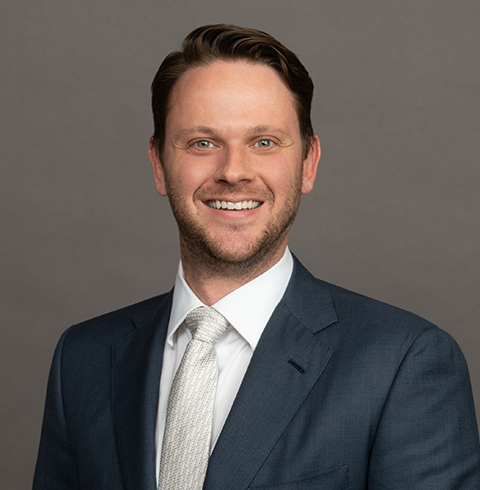 A headshot of Daniel Wilkinson.