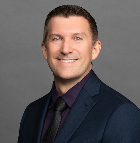 A headshot of Michael West.