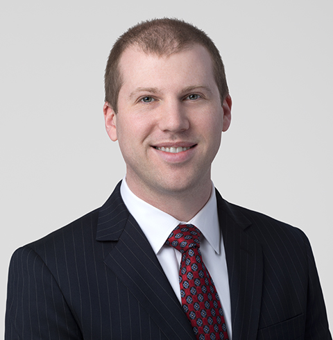 A headshot of James Zack.